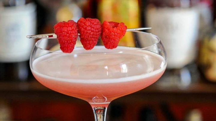 Pink cocktail with berries