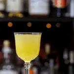 Yellow cocktail in glass