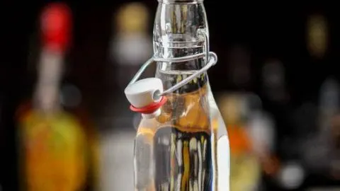 Clear Simple Syrup in swingtop bottle