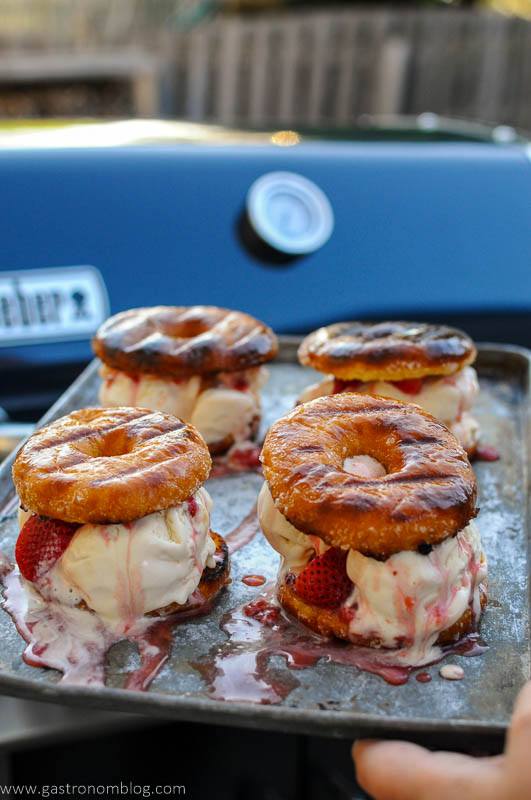 Ice Cream Sandwiches on cookie sheet with strawberries