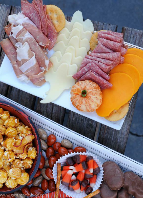 Halloween shaped cheeses and meats on plates