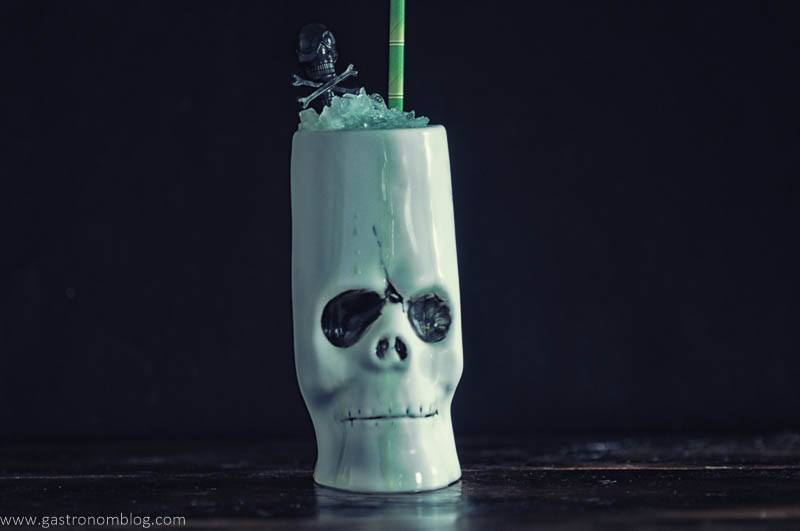 Key Lime Colada cocktail in a skull tiki mug