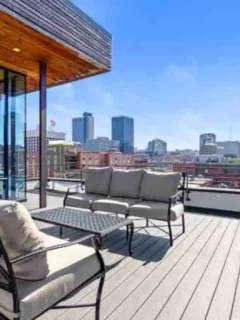 Rooftop deck in Kansas City with outside furniture at one of our unique vacation rentals