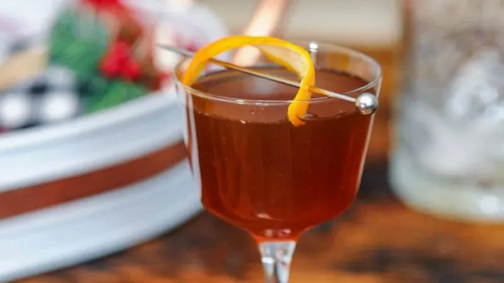 Brown cocktail in coupe made with Spirit Hub products