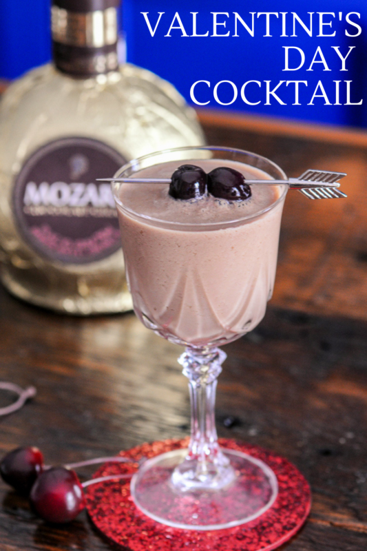 chocolate cocktail in coupe with liqueur bottle behind