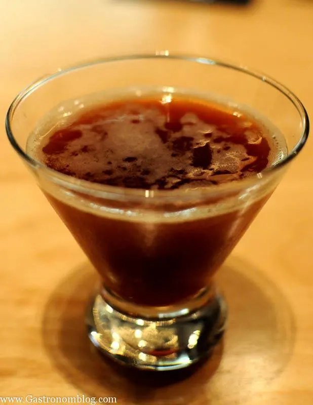 Brown cocktail in glass