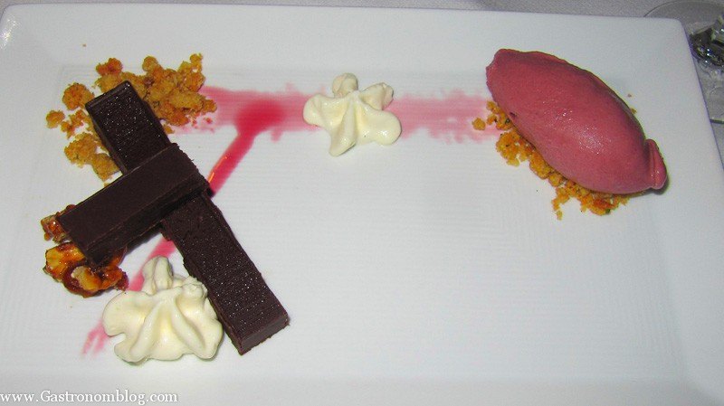 Chocolate bar and purple ice cream on white plate at V Mertz Restaurant Omaha