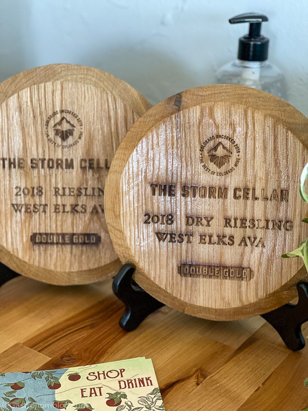 Wooden awards for the Storm Cellar on stands