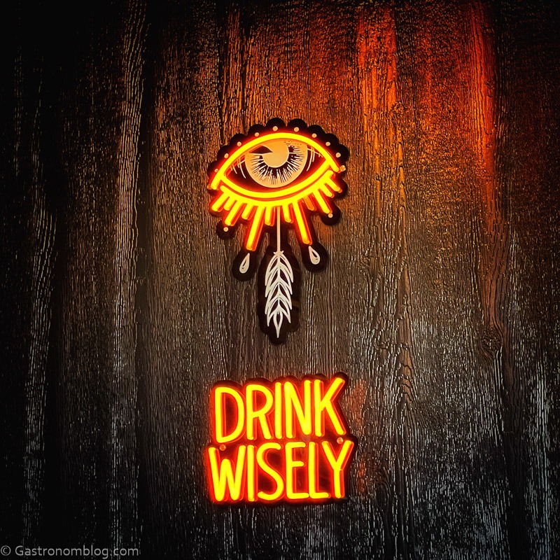 Drink Wisely Neon eye sign at Wise I Brewing for Iowa Brewery Tour and Iowa Beer Passport