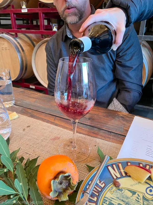 red wine being poured into glass