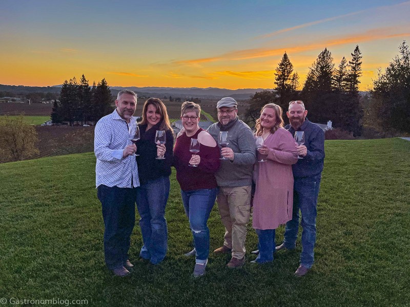 6 people in front of the sunset while touring Sonoma Vineyards