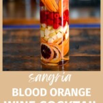Layered Blood Orange Sangria in a pitcher