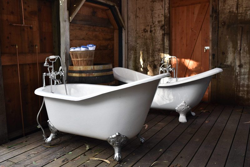 2 clawfoot tubs in wooden building