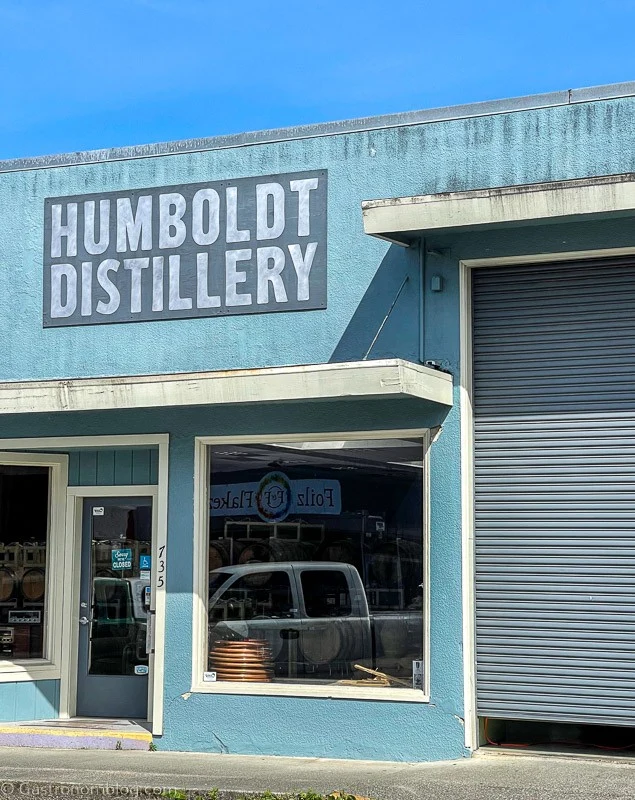 Outside of Humboldt Distillery, a blue building