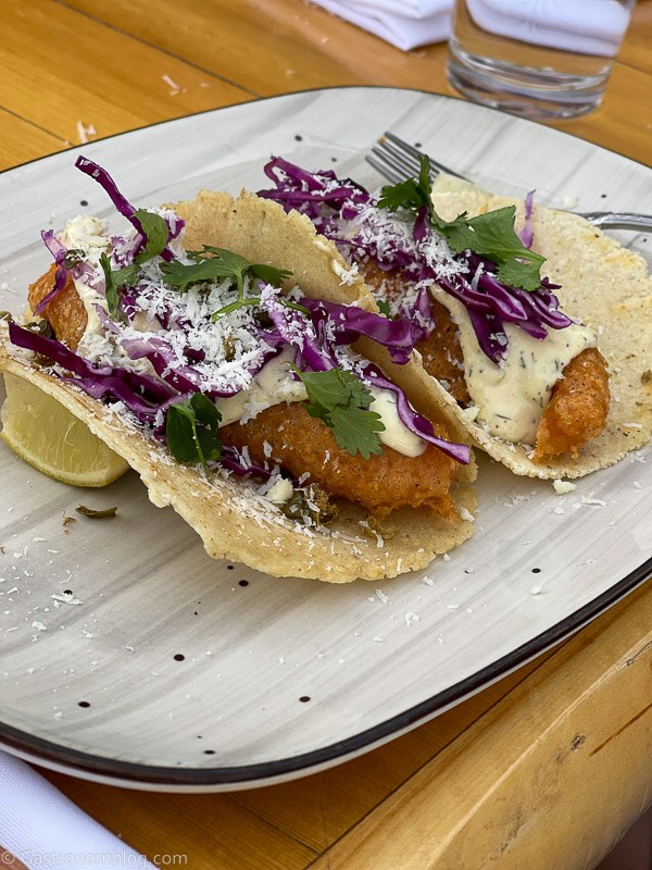fried trout tacos with cabbage on pottery plate at Boulder Mountain Guest Ranch and Sweetwater Kitchen