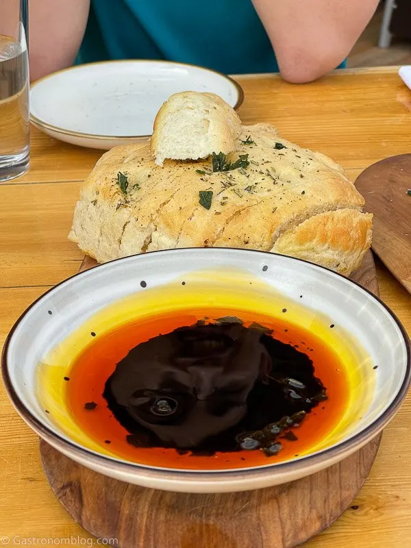 bread and olive oil with balsamic vinegar in pottery bowl at Boulder Mountain Guest Ranch and Sweetwater Kitchen