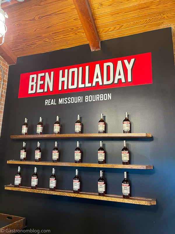 Ben Holladay bottles lined up on shelves