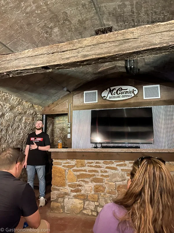 tv on wall in ancient cave as part of tour at Hollday Distillery