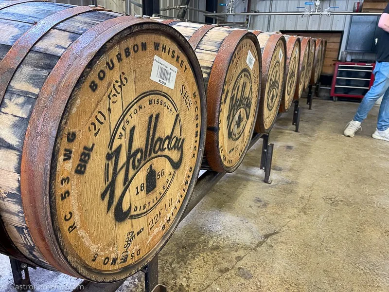 Barrels in a row at Hollday Distillery