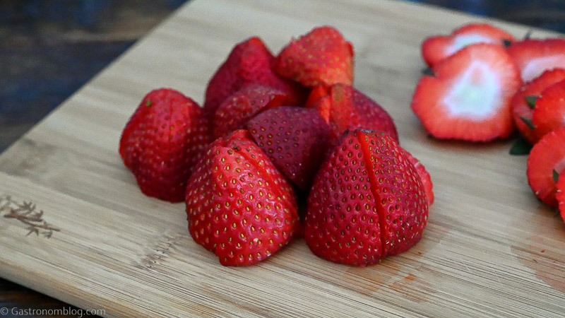 Cut strawberries on a cutting board