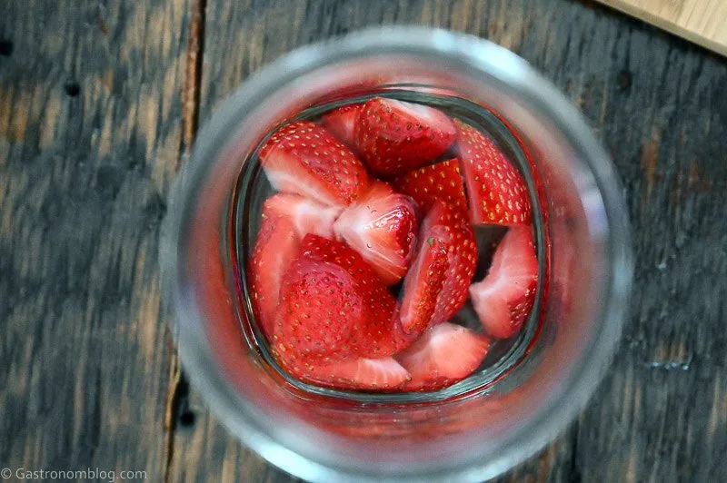 Strawberries in jar in liquid