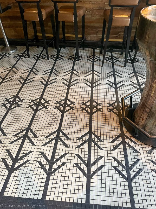 tiled floor in black and white at Hewing Hotel Minneapolis
