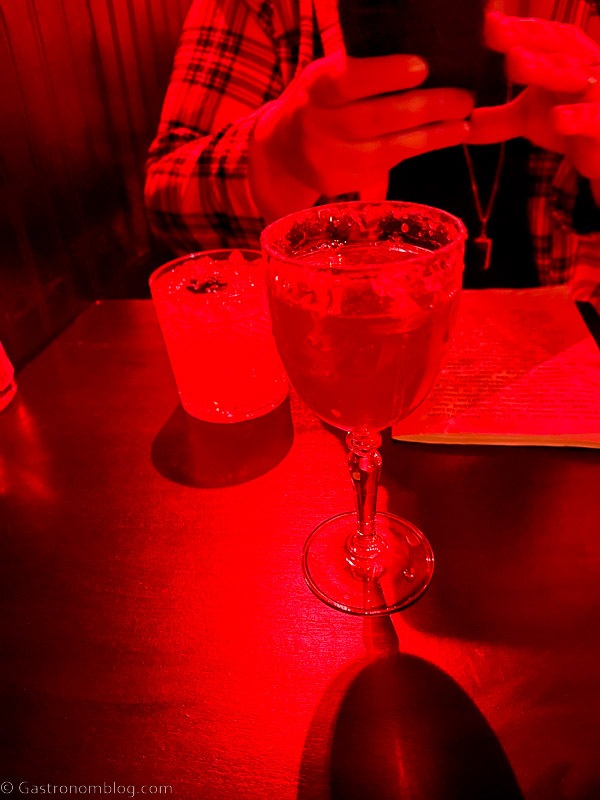 cocktail in coupe at Anna's Place with red light