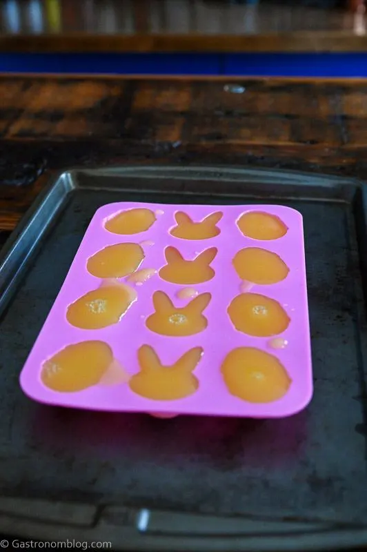 orange juice in a pink Easter Ice Mold