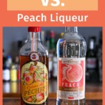 2 bottles of peach liqueur on a wooden table