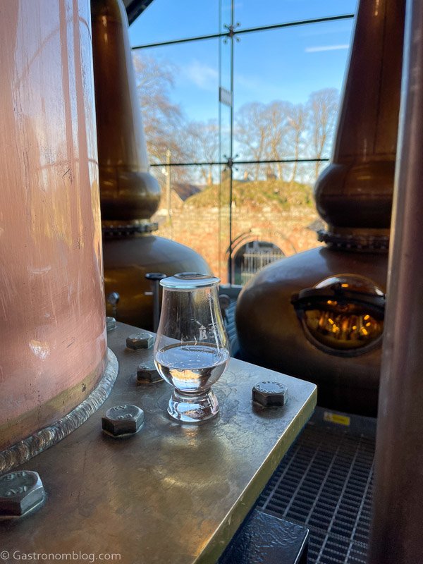 glencairn glass at Lindores Abbey Distillery next to copper still