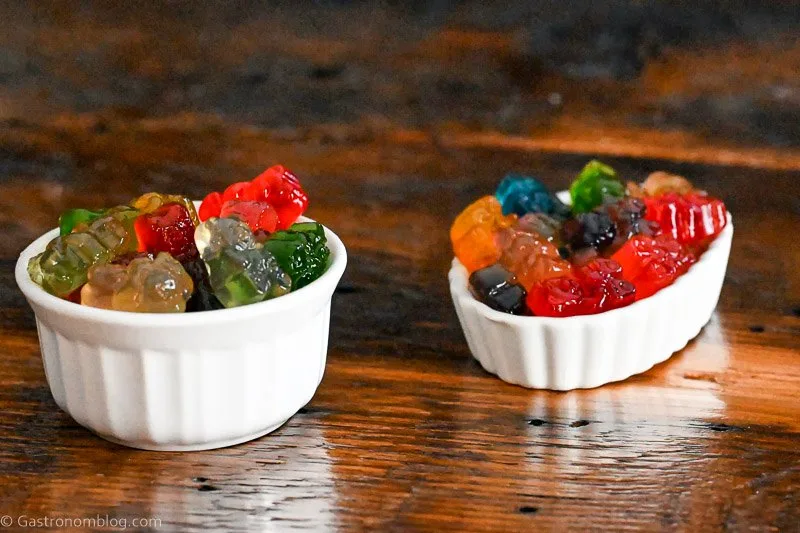 colorful gummy bears in white ramekins