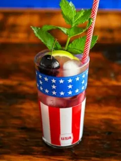 Cherry Mojitos in flag printed glasses with mint and red straws