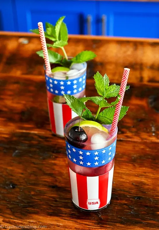 Cherry Mojitos in flag printed glasses with mint and red straws