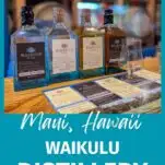 blue bottles in a row on bar at Waikulu Distillery on Maui