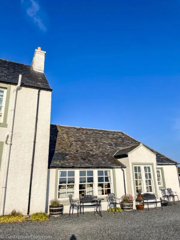 white outside facade of Glenegedale House on Isle of Islay Scotland