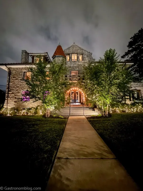 outside of Aida Hotel Kansas City at night, all lit up