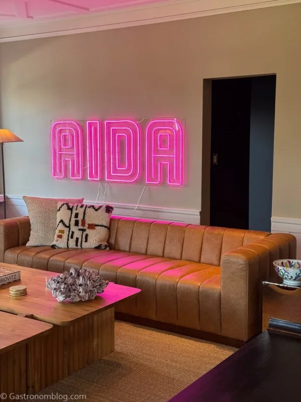 pink neon "aida" light in sitting room at Aida Hotel Kansas City