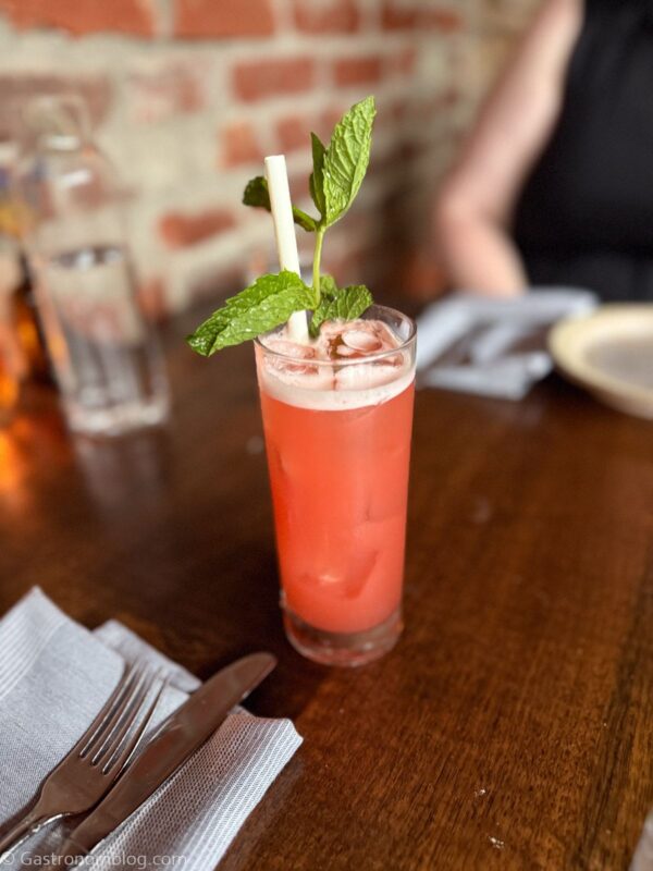 pink cocktail on table at Fox & Pearl Kansas City