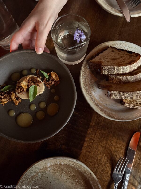 overhead shot of foie gras on gray plate and side plate of bread at Fox & Pearl Kansas City
