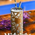 Midnight Margaritas in Metal chased floral tumblers with skull straw, lavender garnishes on wooden table