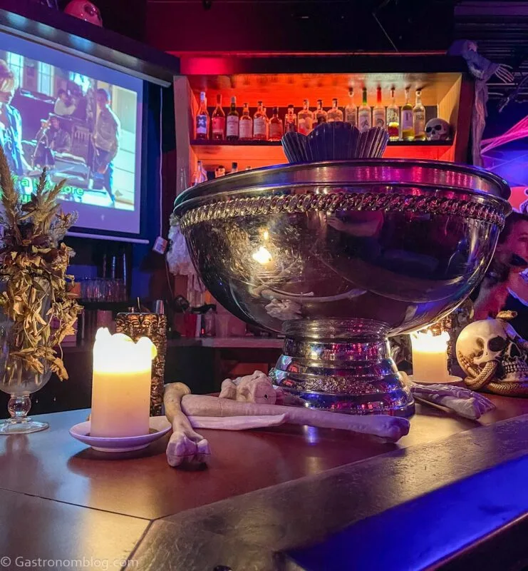 silver punch bowl under Halloween lights at the Black Lagoon Pop Up at Nite Owl, Omaha