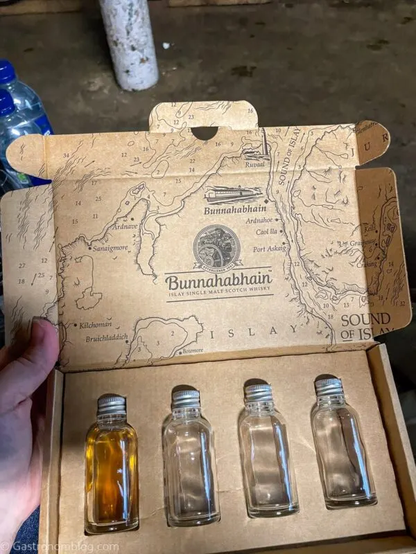 drivers drams in a cardboard box (small tasting bottles) of Bunnahabhain whisky during the Bunnahabhain Distillery Tour
