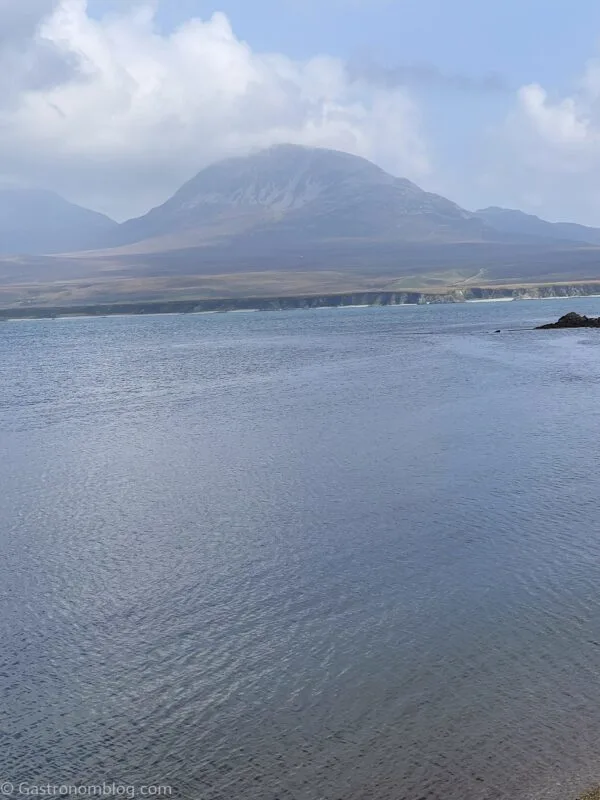 view over the harbor at Bunnahabhain Distillery to Jura