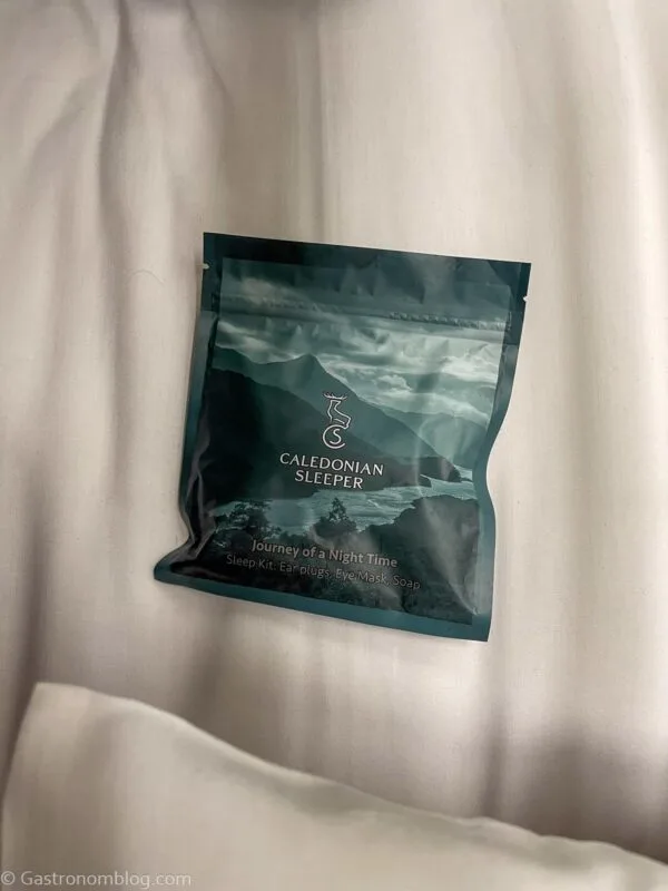 kit included in cabin on Caledonian Sleeper Train with eye mask and ear buds, and soap