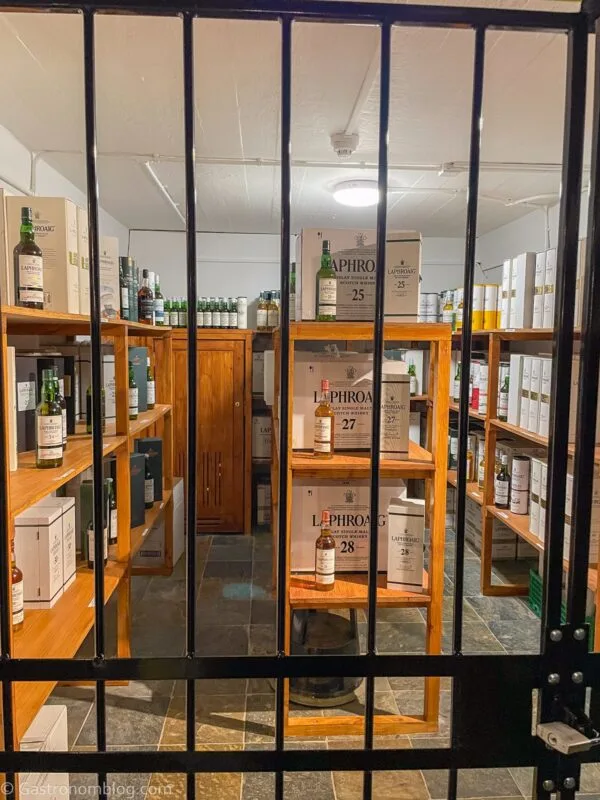 exclusive bottles behind cage at Laphroaig Distillery