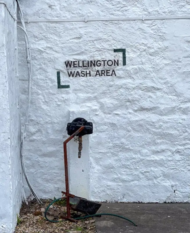 wellington wash area labeled on white building at Laphroaig Distillery